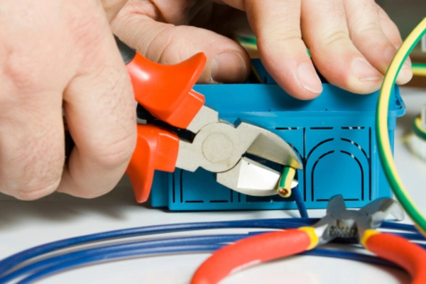 Electrician working on residential electrical wiring